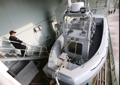 HMCS Harry DeWolf naval officer June Choi is shown with the ship’s multi-role rescue boat while docked at the Dieppe Gardens in Windsor on Tuesday, October 29, 2024. PHOTO BY DAN JANISSE /Windsor Star