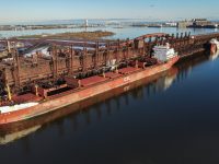 Oakglen and Arthur M Anderson topping off at CN 6. In the background the American Mariner departing with a load of grain and the American Integrity loading at SMET. Chris Mazzella (Nov 2021)