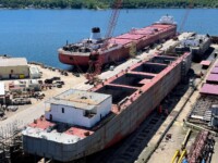 Work continues of Mark W. Barker at Sturgeon Bay. Roger Blough is in the background. Interlake Steamship Co. (June 2021)